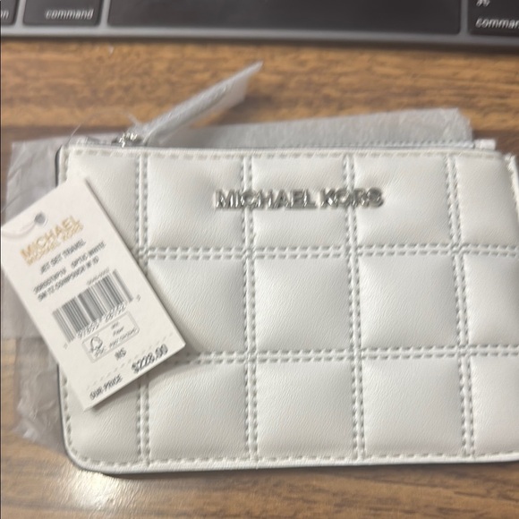 Michael Kors Quilted White Pouch with Silver Logo - Picture 1 of 4